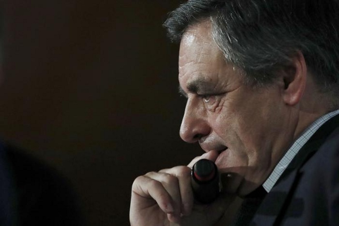 French police search Fillon office as fraud affair rocks campaign